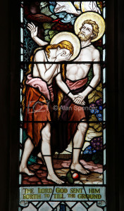 Stained glass window of expulsion from Eden