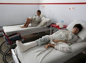 Wounded Afghan boys, who survived a U.S. air strike on a Medecins Sans Frontieres (MSF) hospital in Kunduz, receive treatment at the Emergency Hospital in Kabul October 8, 2015. REUTERS/Mohammad Ismail