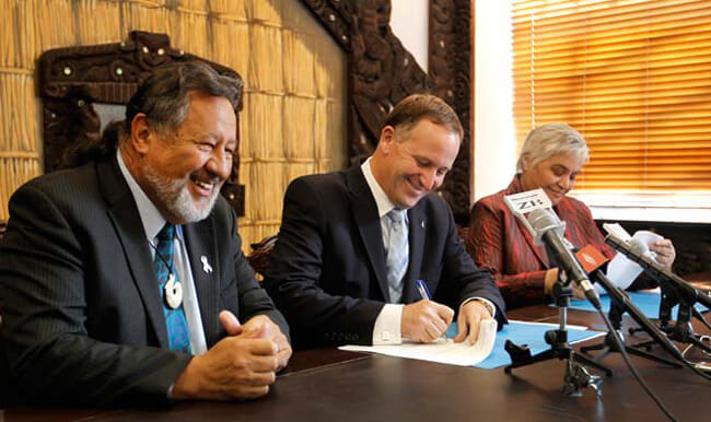 Pita Sharples, John Key, Tariana Turia, signing National-Maori Party coalition agreement