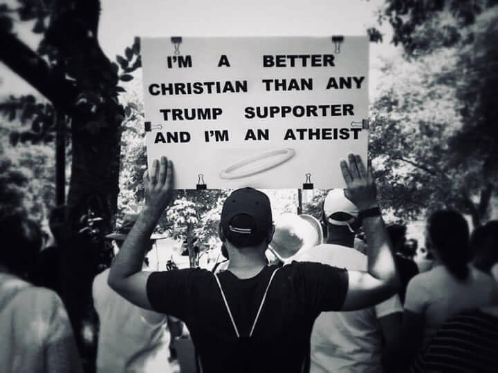 Pic of protest sign: I'm a better Christian than any Trump supporter and I'm an atheist